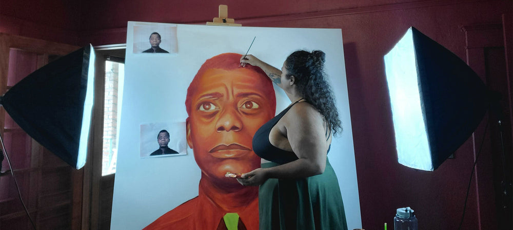 Antoinette Cauley Painting a Canvas Portrait of James Baldwin